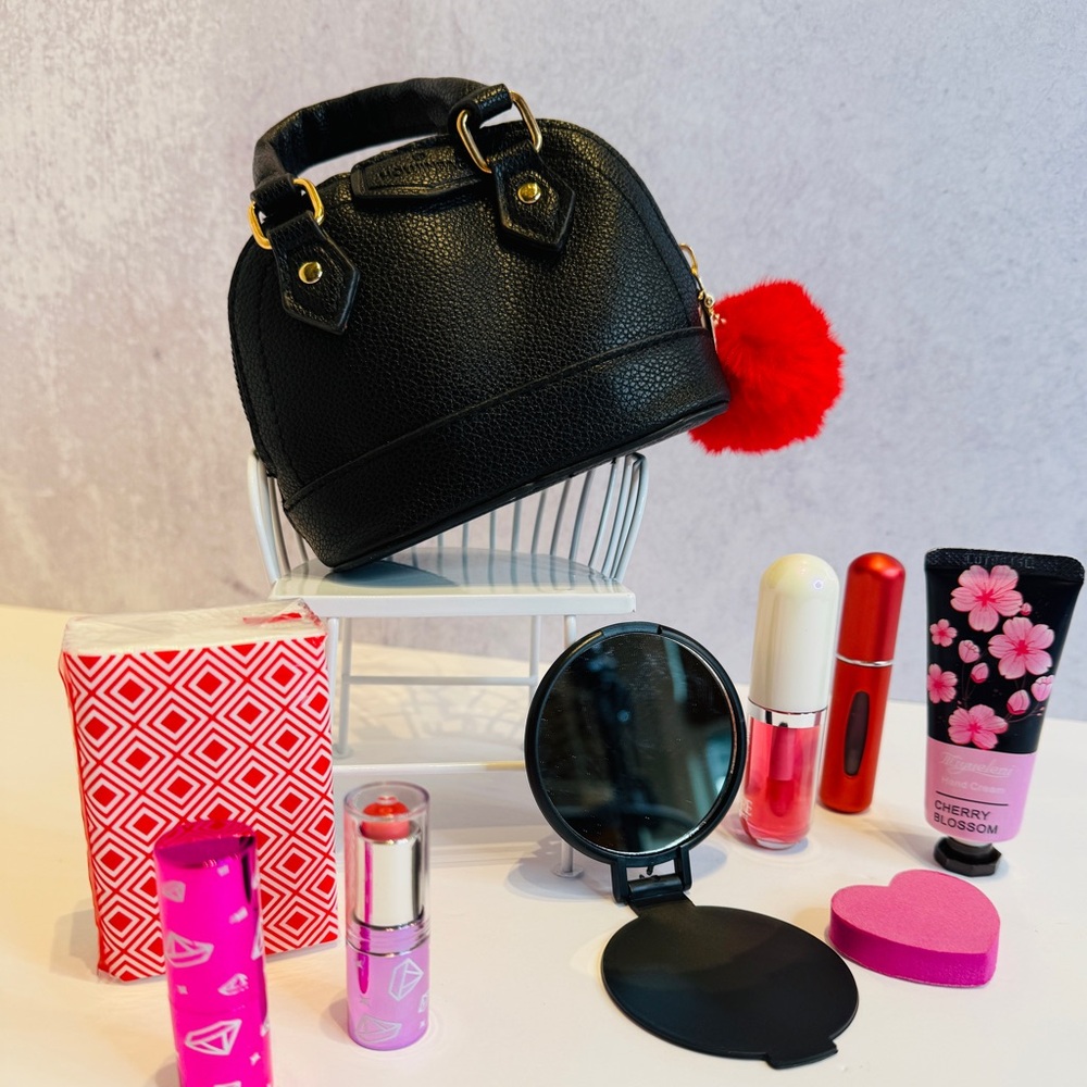 Black Mini Handbag with Red Pom Pom